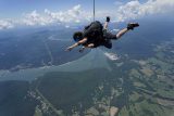 Tandem skydiver enjoying their jump with the Chattanooga Skydiving Company instructor