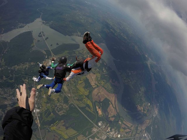 AFF student participating in hands on training while in free fall